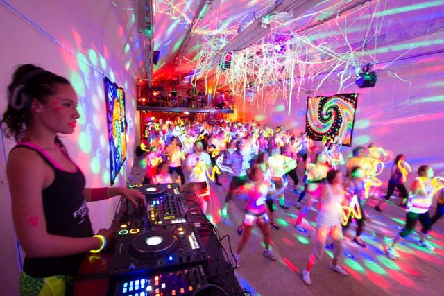 Move to the music: clubbers feel the beat at one of Fitness Freak's pop-up raves in London. The idea of fitness parties originated in the United States