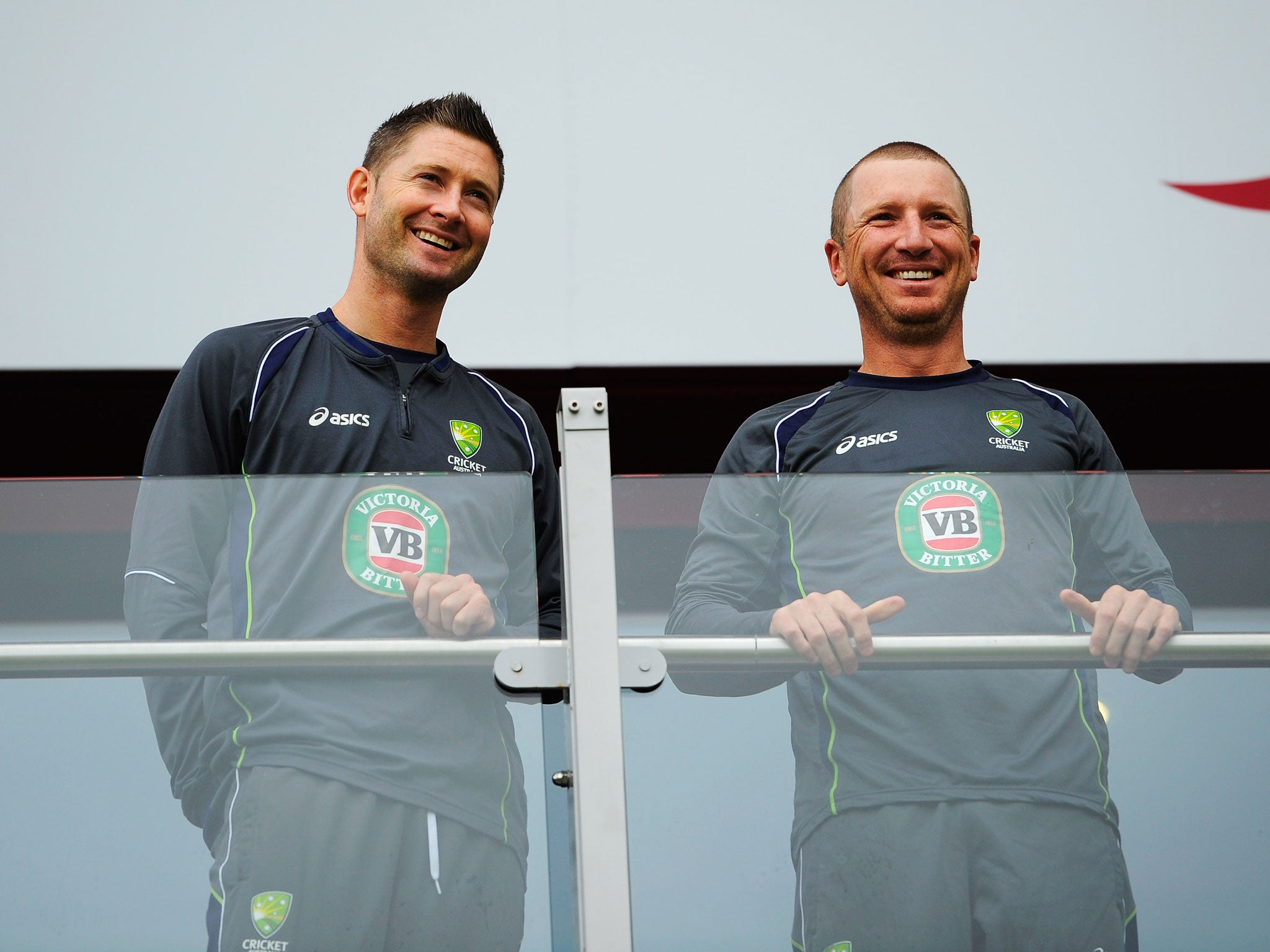Michael Clarke and Brad Haddin smiling before the start of play