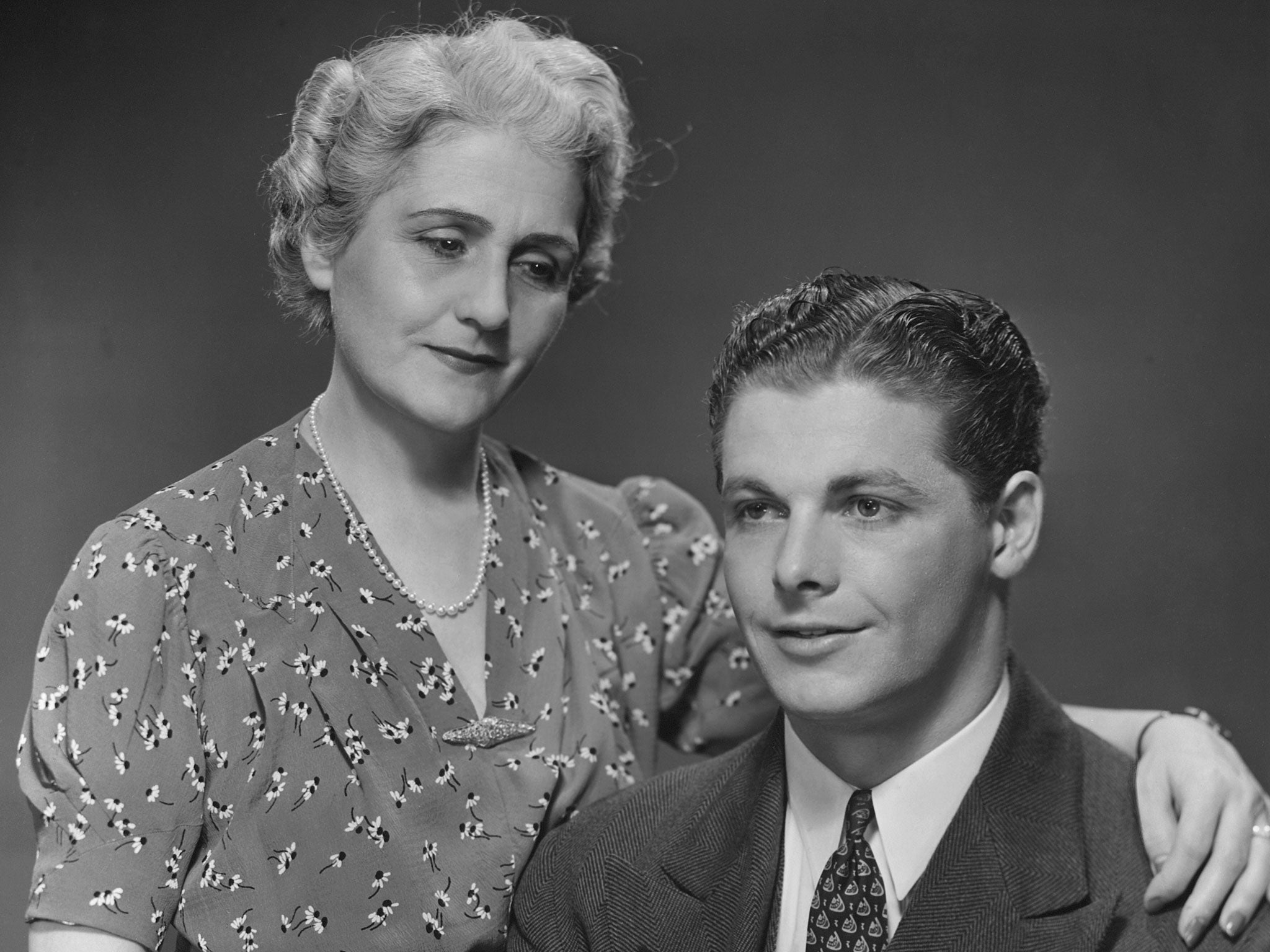 CIRCA 1950s: Mother and son.