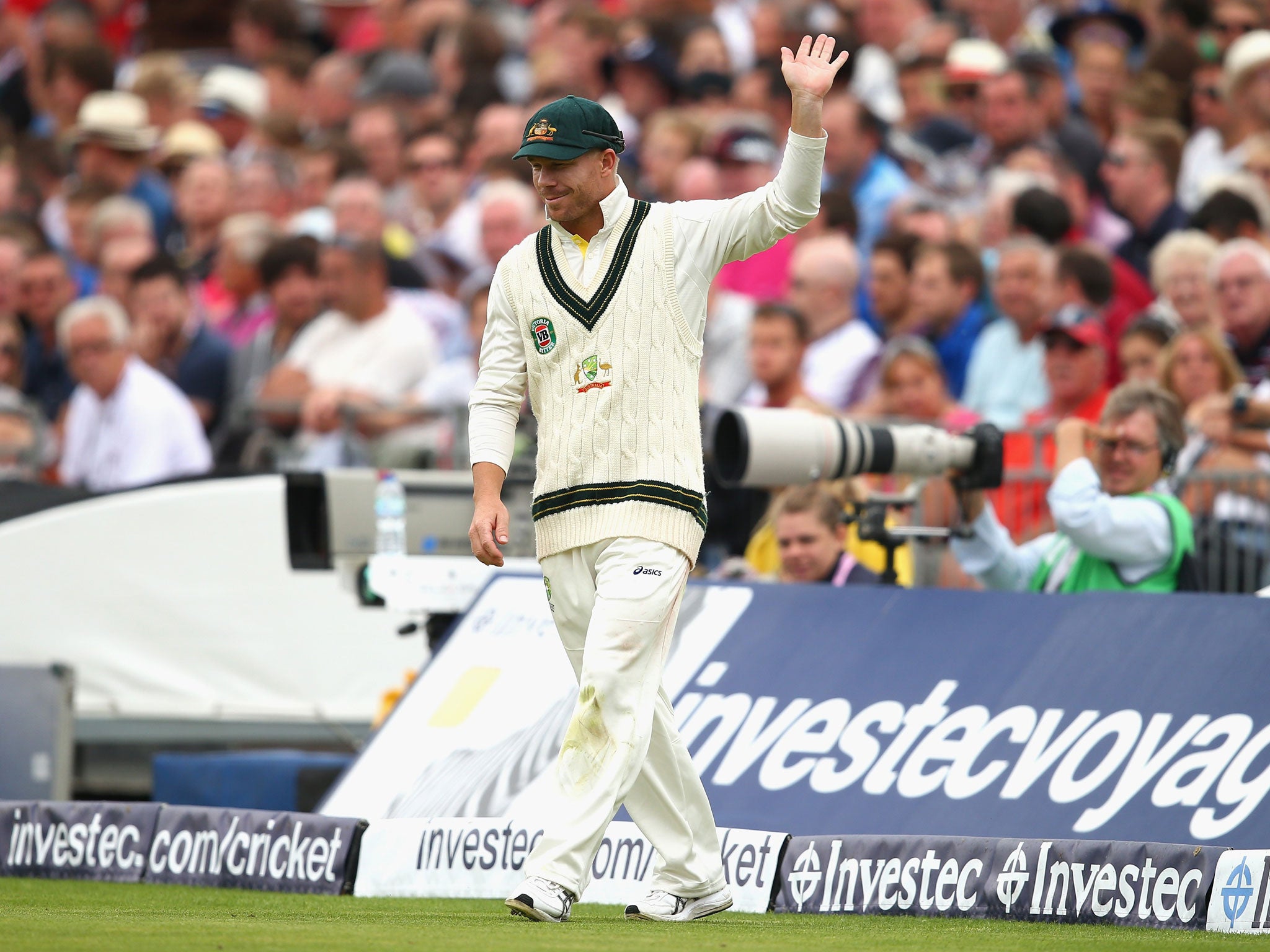 David Warner good-naturedly acknowledges the crowd's attempts to sledge him at Old Trafford