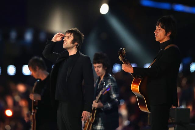 Liam Gallagher performing with Beady Eye. Guitarist Gem Archer was admitted to hospital with "severe head trauma" after an accident.