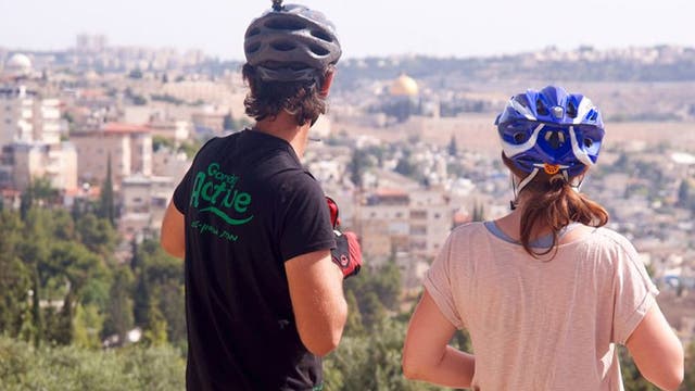 On a city cycle tour looking towards Jerusalem