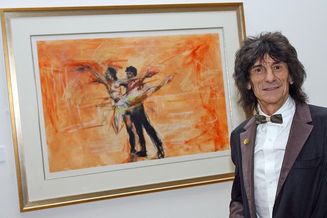 Ronnie Wood with his painting 'A Study of Carlos and Darcey Rehearsing' at The Royal Academy of Art on 27 February 2008 in London