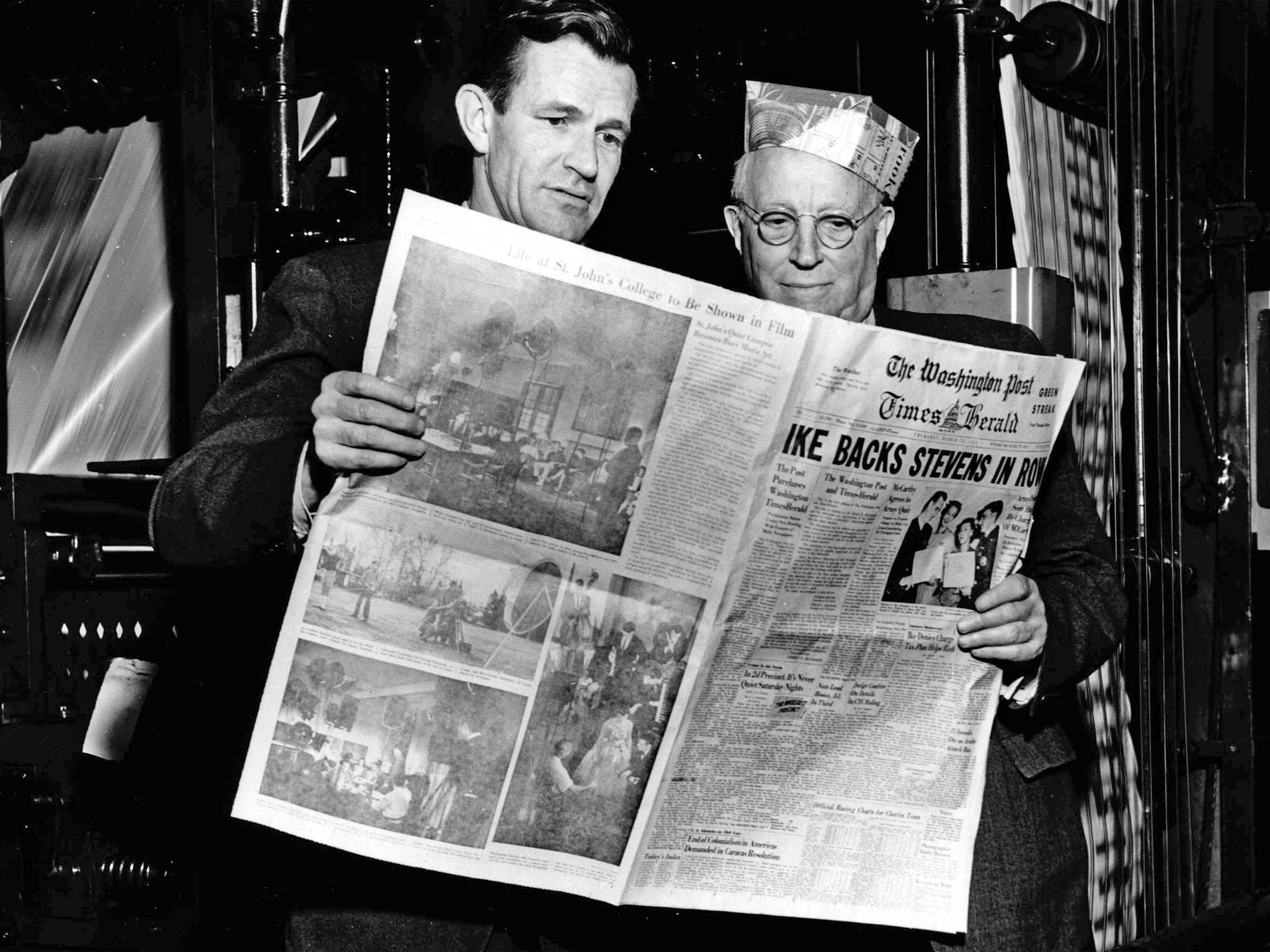 Philip Graham, left, and Eugene Meyer with the first edition in 1954