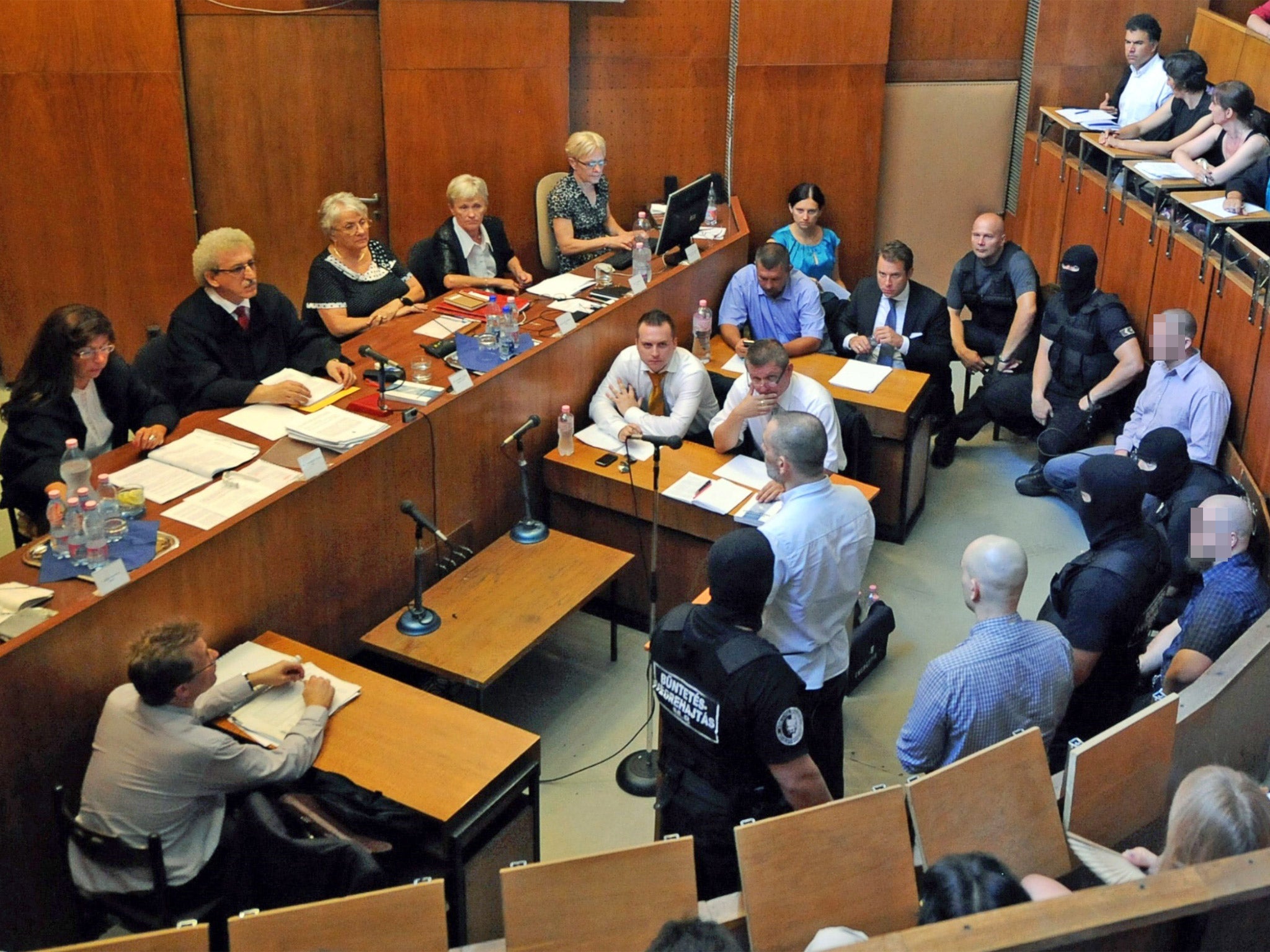 The four Hungarian far-right extremists in court during their trial in Budapest