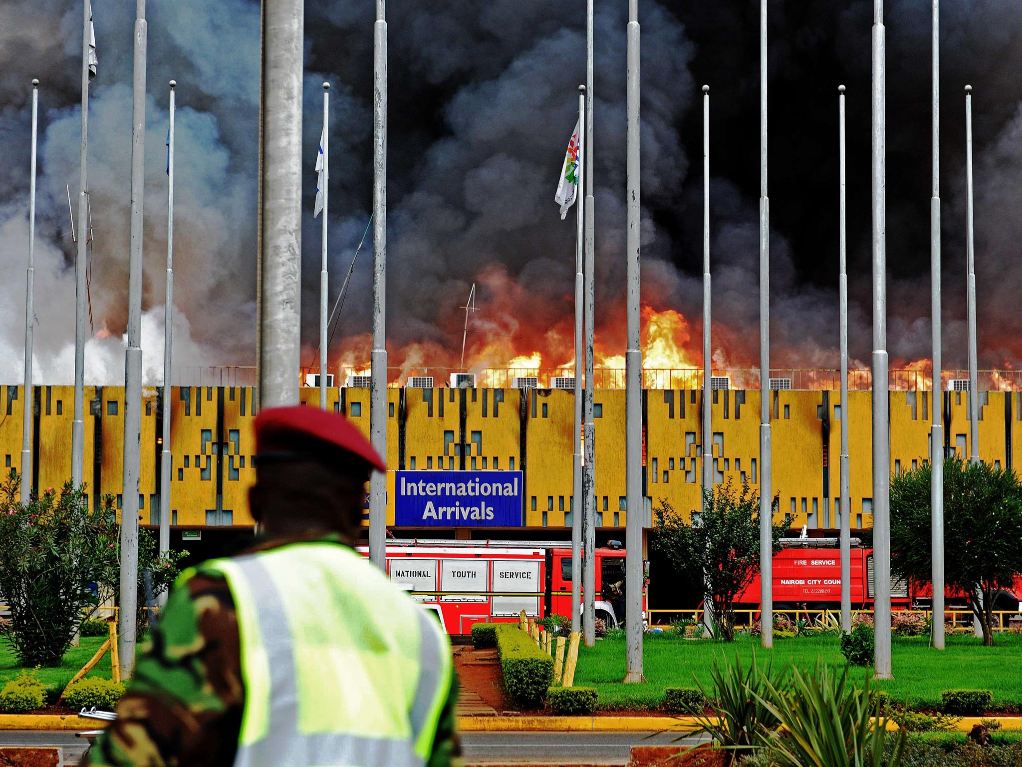 Flames and black smoke billow from the burning Jomo Kenyatta international airport, Nairobi. A massive fire shut down Nairobi's international airport today with flights diverted to regional cities as firefighters battled to put out the blaze in east Africa's biggest transport hub