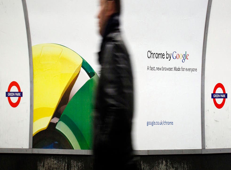 A man walks past a poster for Google's Chrome browser in an underground station in central London January 25, 2010. 
REUTERS/Luke MacGregor