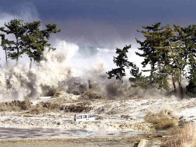 The tsunami hits the coast of Fukushima prefecture after the earthquake on 11 March 2011