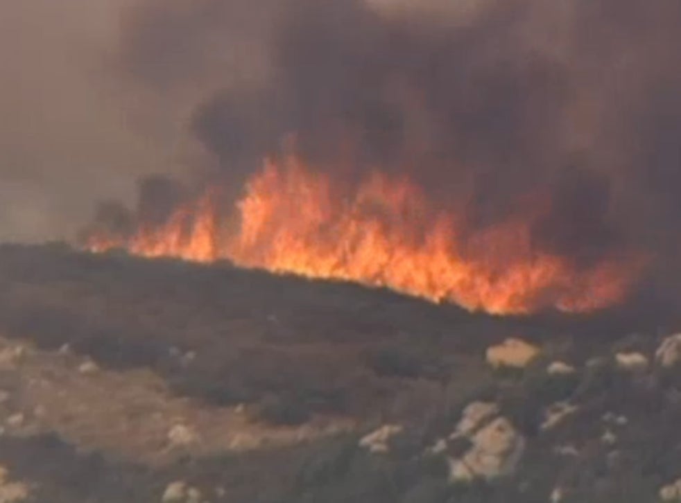 California wildfire seen spreading rapidly and burning across 6,000 acres in Riverside County in