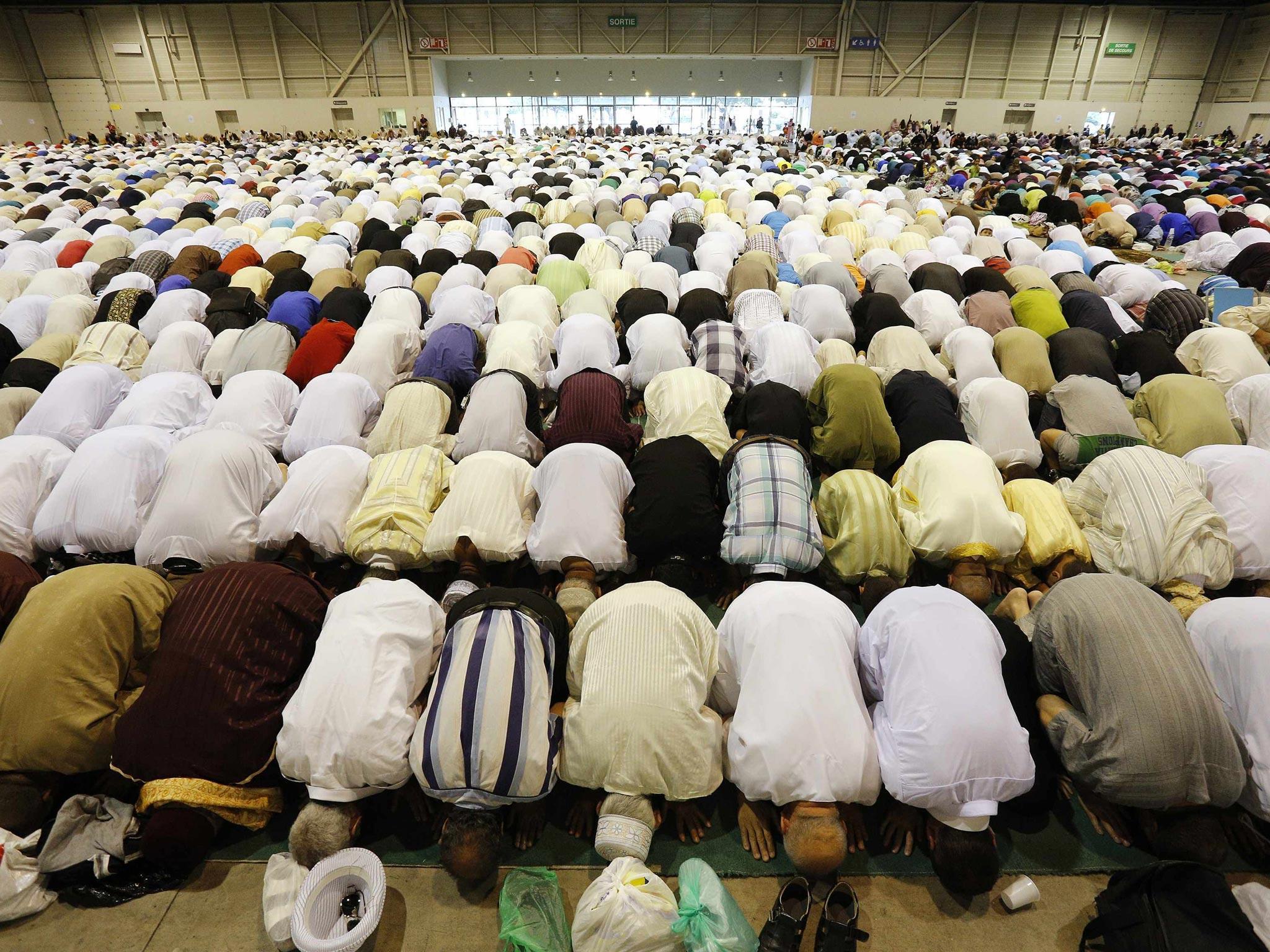 Palestinians attend Eid al-Fitr prayers in Gaza City