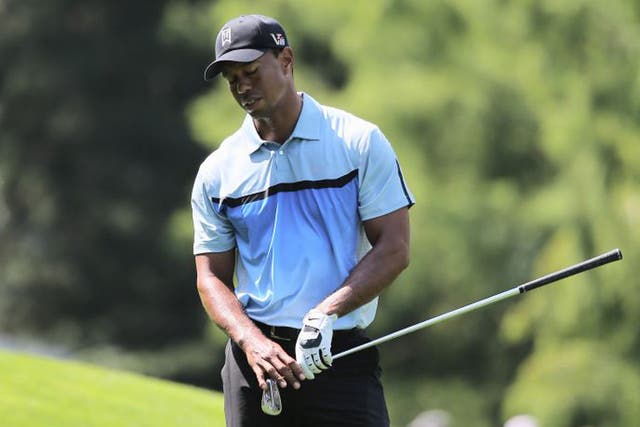A double bogey on the last hole has put Woods six shots adrift of the clubhouse leader