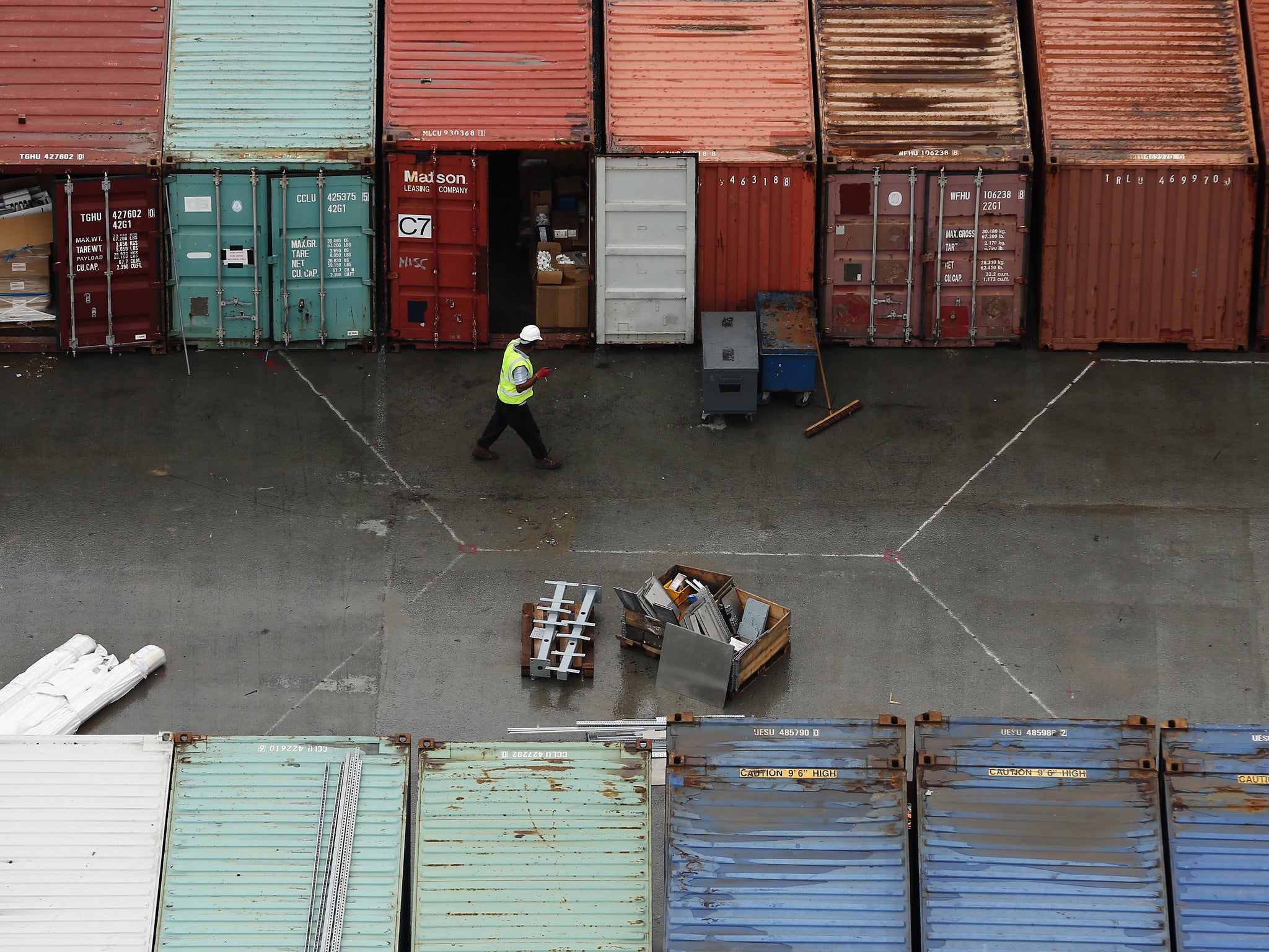 Gearing up for future exports: Workers at DP World London Gateway Port in Stanford-le-Hope, Essex. The port is due to open towards the end of the year, and will be Europe's largest