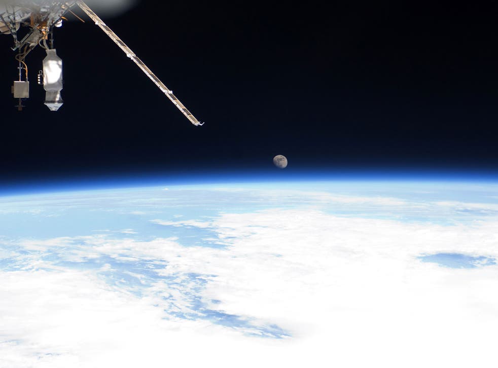 Earth's horizon and the moon seen from the International Space Station July 12, 2011 