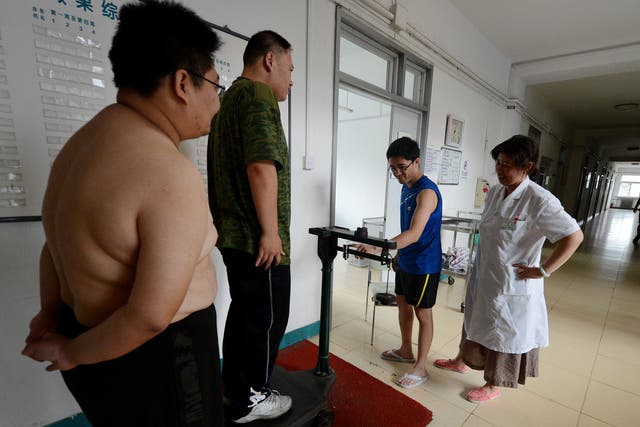 Patients attend a weight-loss clinic in the city of Tianjin.