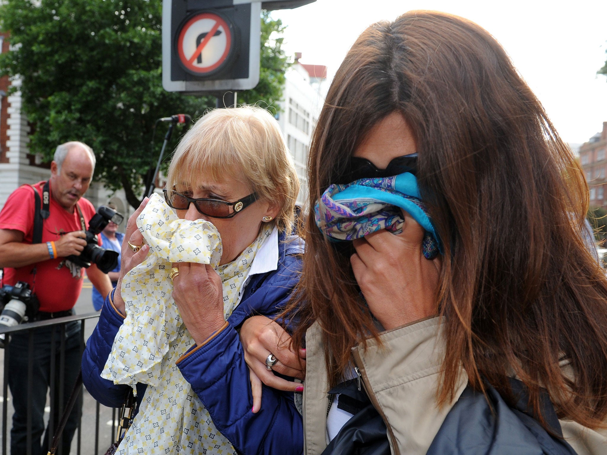 Domenico Rancadore's wife, Ann, and daughter Daniela outside court