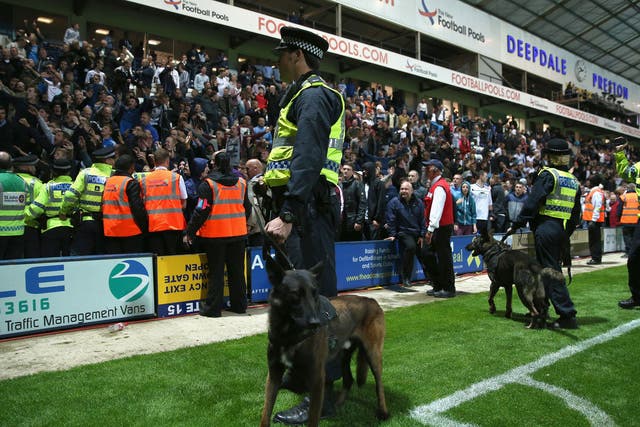 Mounted police try to restore order at Deepdale on Monday night