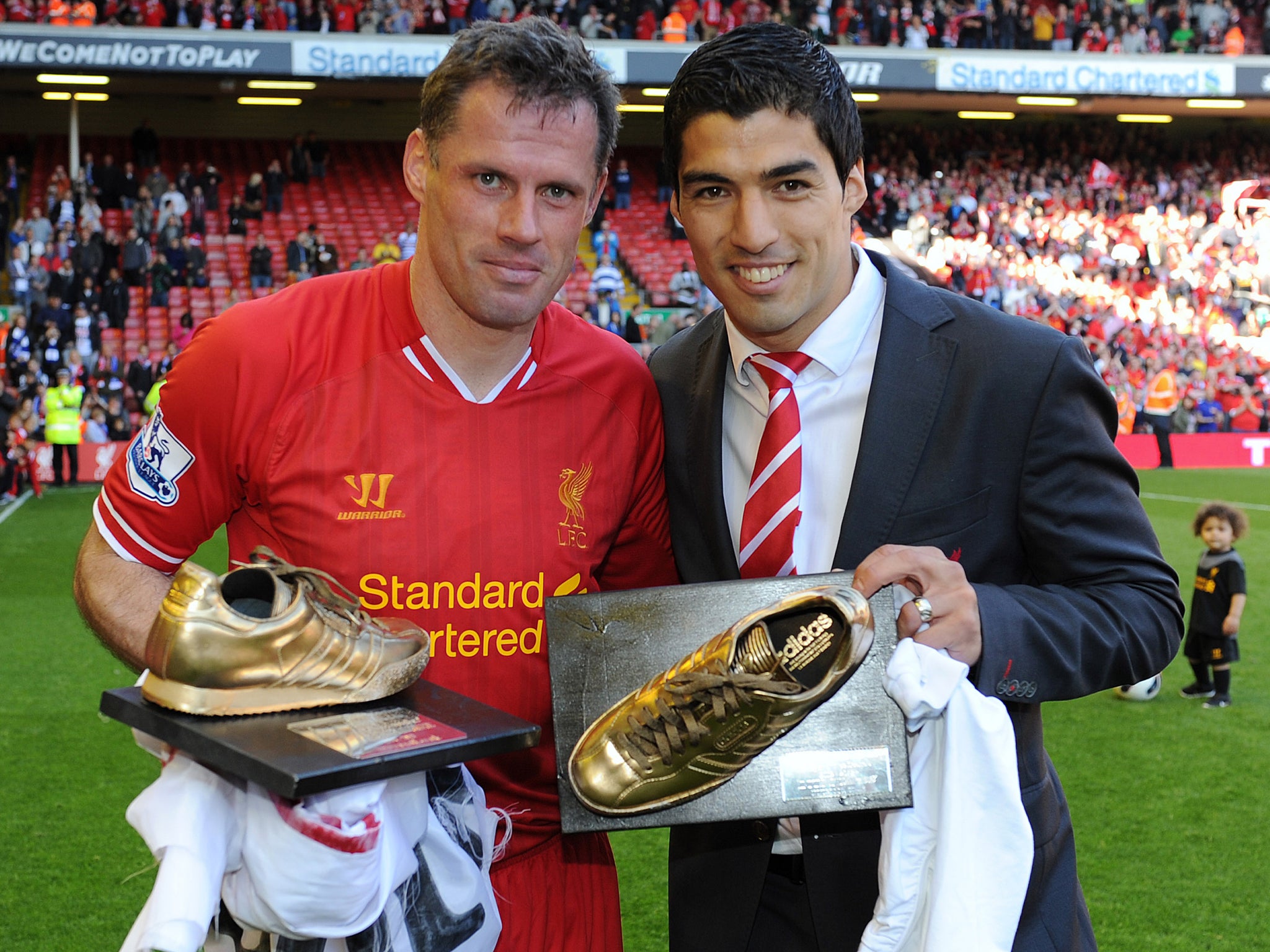 Jamie Carragher and Luis Suarez are pictured together on the final day of the 2012/13 Premier League season