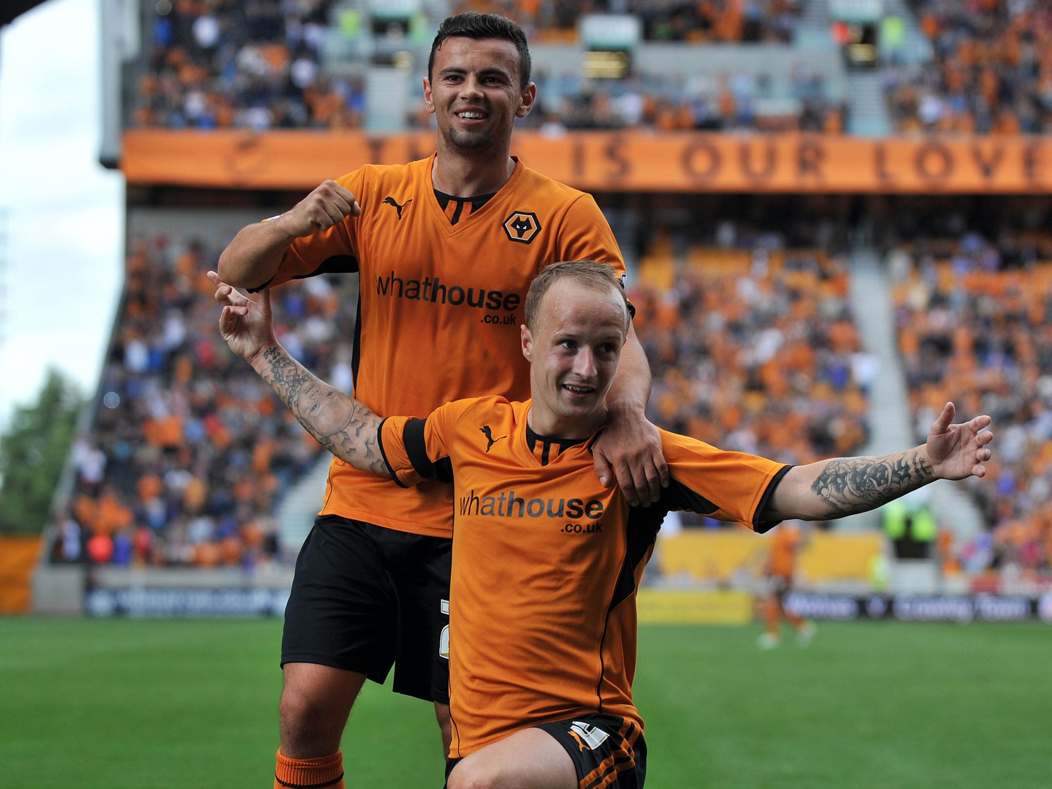 Old golden boy: Leigh Griffiths milks the applause for his second Wolves goal