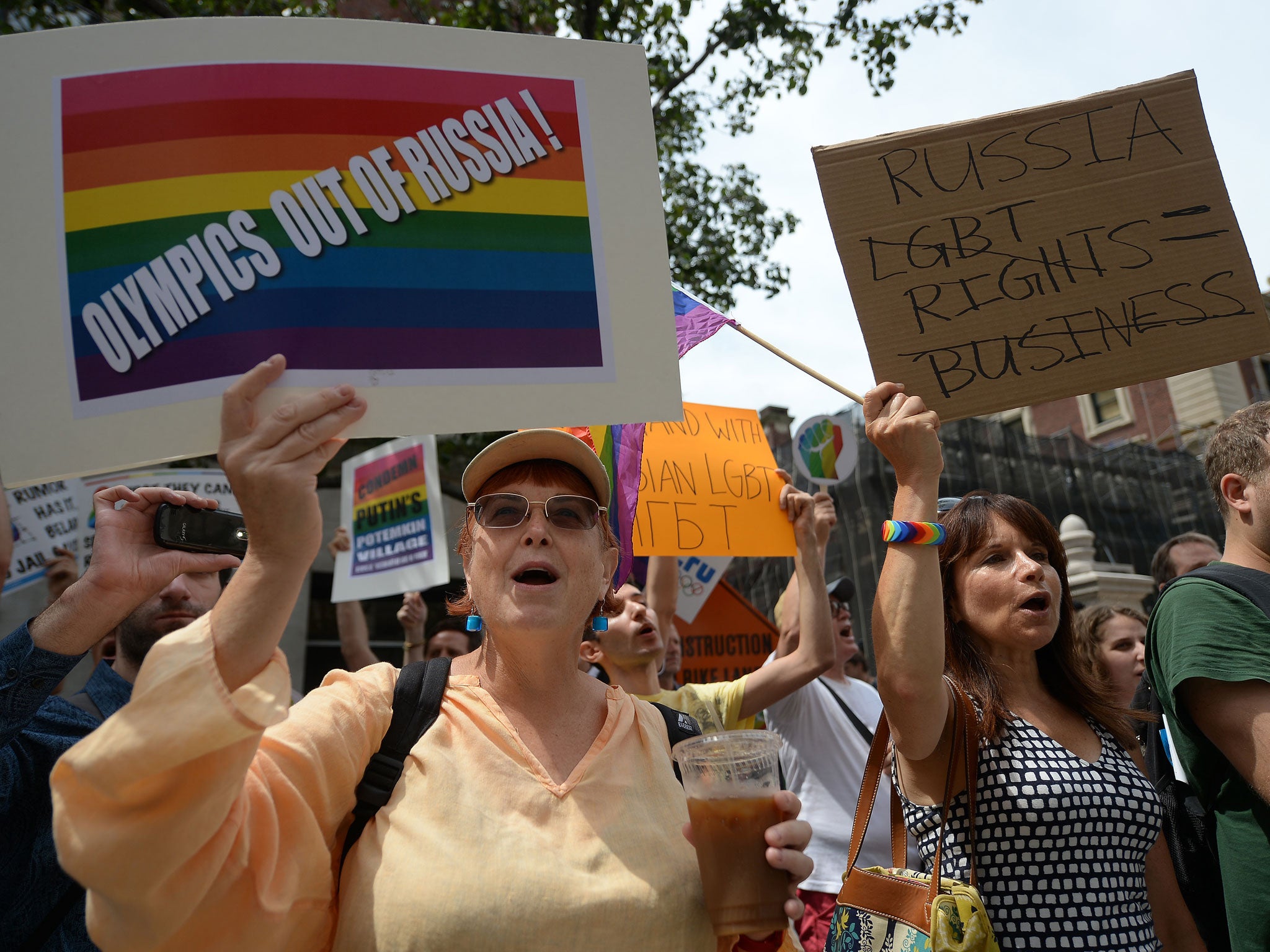 Protesters hold a demonstration against Russian anti-gay legislation and against Russian President Vladimir Putin stands on gay rights, in front of the Russian Consulate in New York, July 31, 2013.