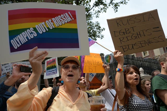 Protesters hold a demonstration against Russian anti-gay legislation and against Russian President Vladimir Putin stands on gay rights, in front of the Russian Consulate in New York, July 31, 2013.