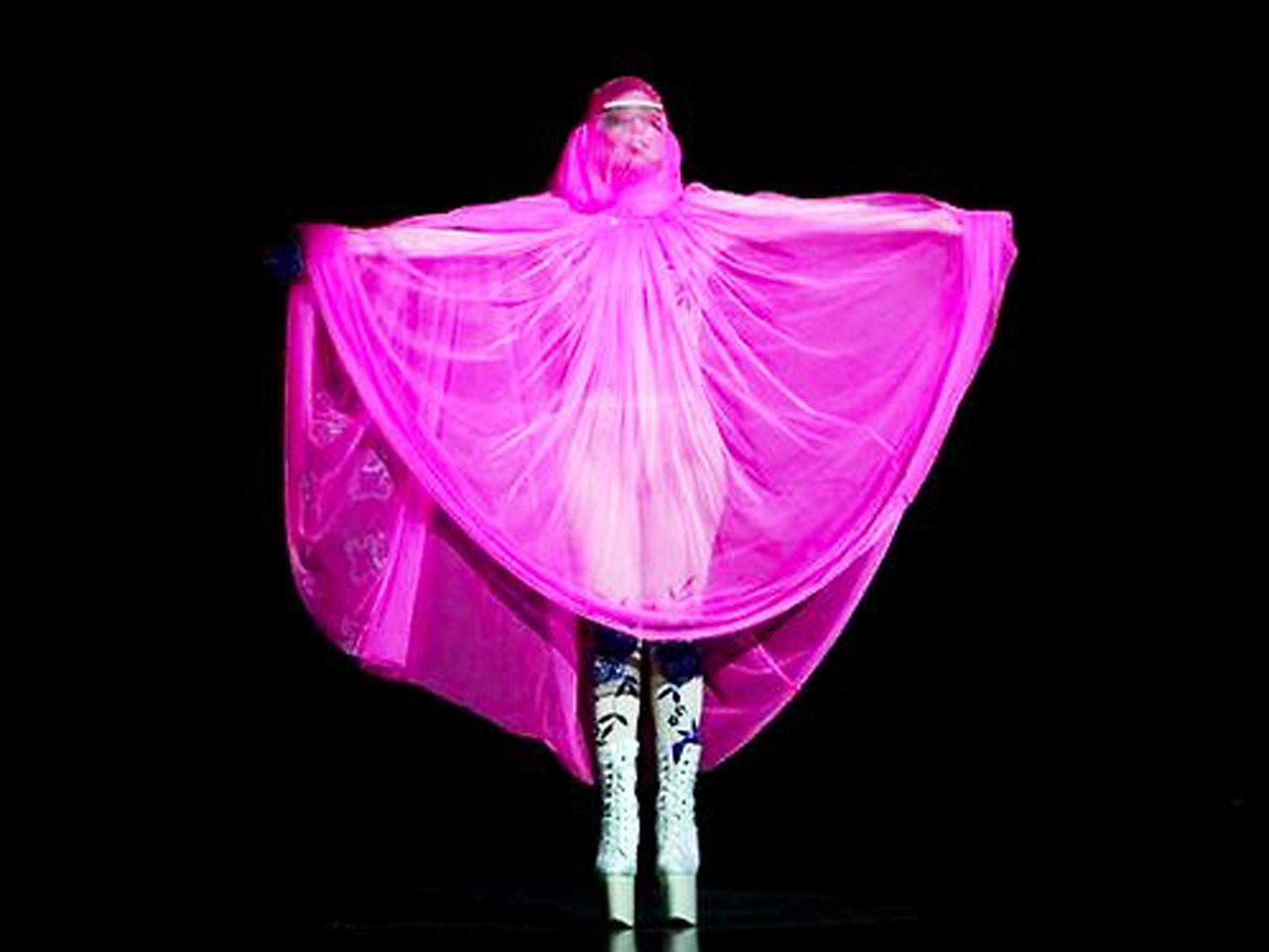 Lady Gaga performs in a pink 'burqa'