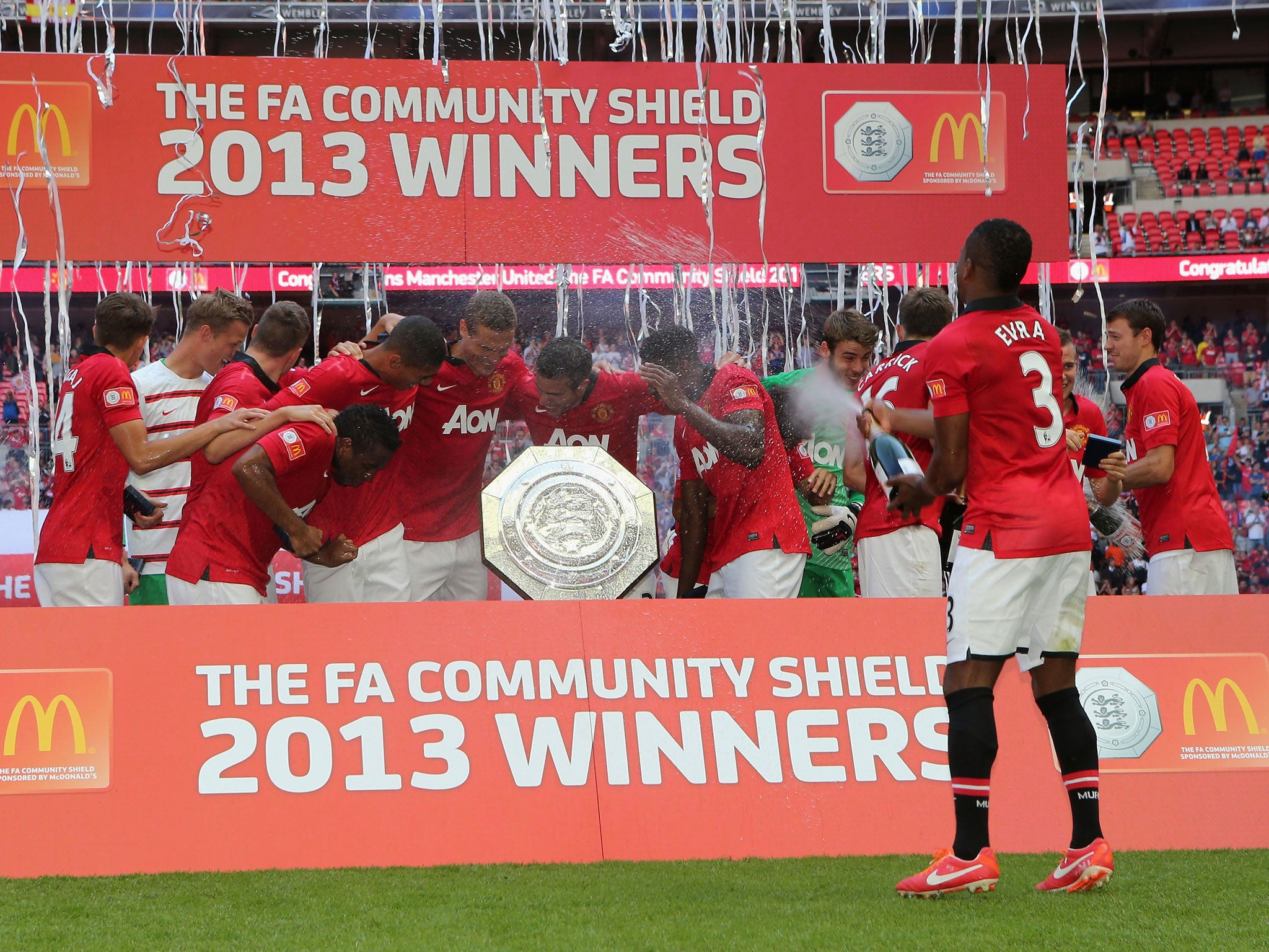 United players celebrate with the FA Community Shield trophy