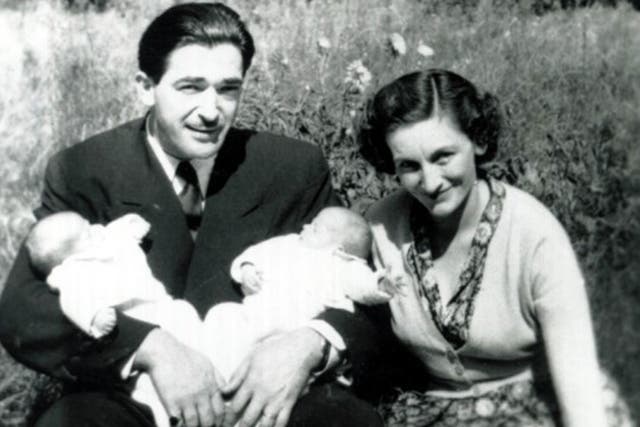 Publicly loyal: Betty Maxwell with her husband Robert and their twin daughters Christine and Isabel at two weeks old in 1950