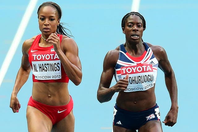 Christine Ohuruogu powers away from Natasha Hastings in the 400m semi-final