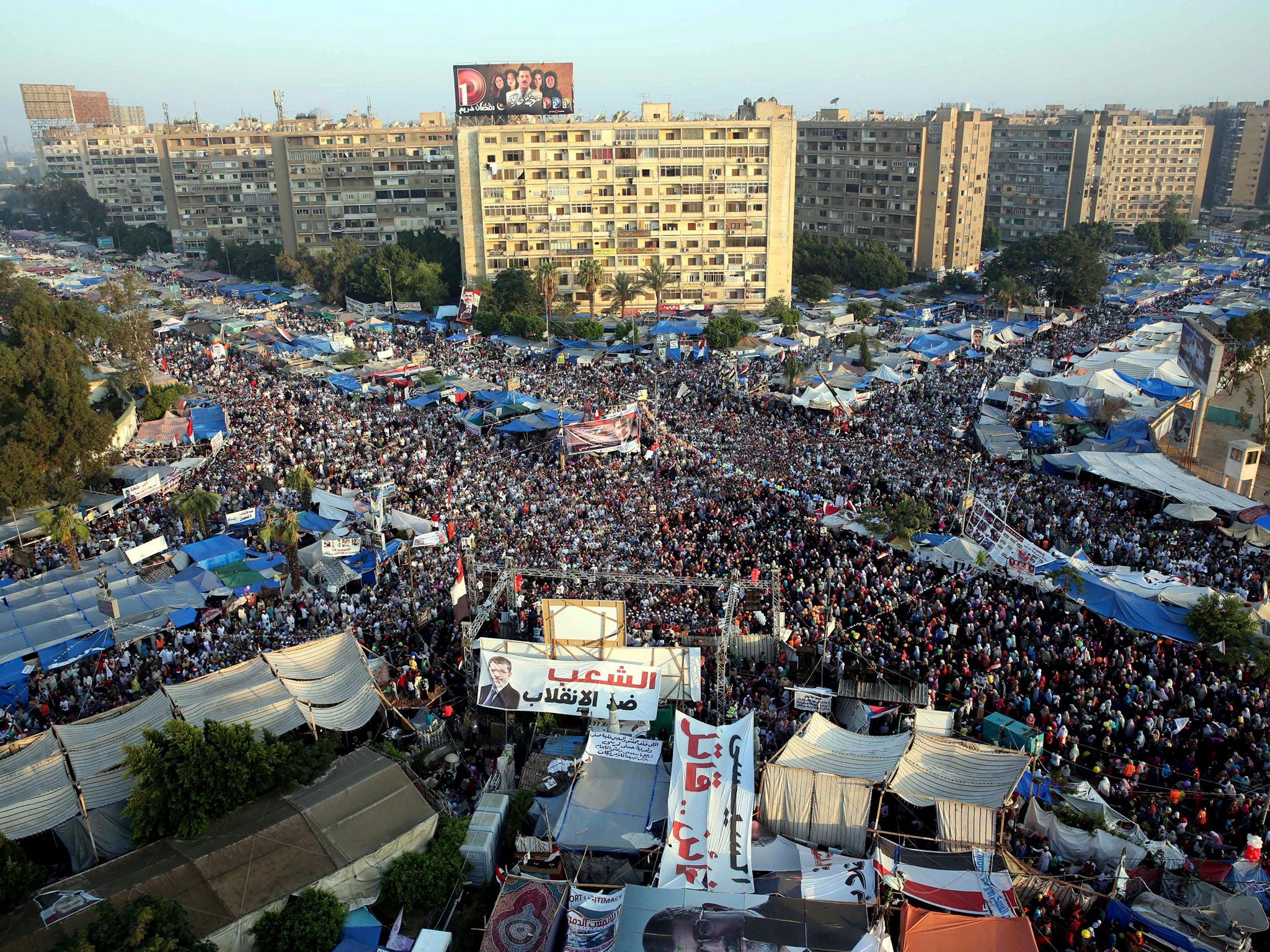 Supporters of the deposed Egyptian President, Mohamed Morsi, continue their sit-in protest near the Rabaa Adawiya mosque in central Cairo