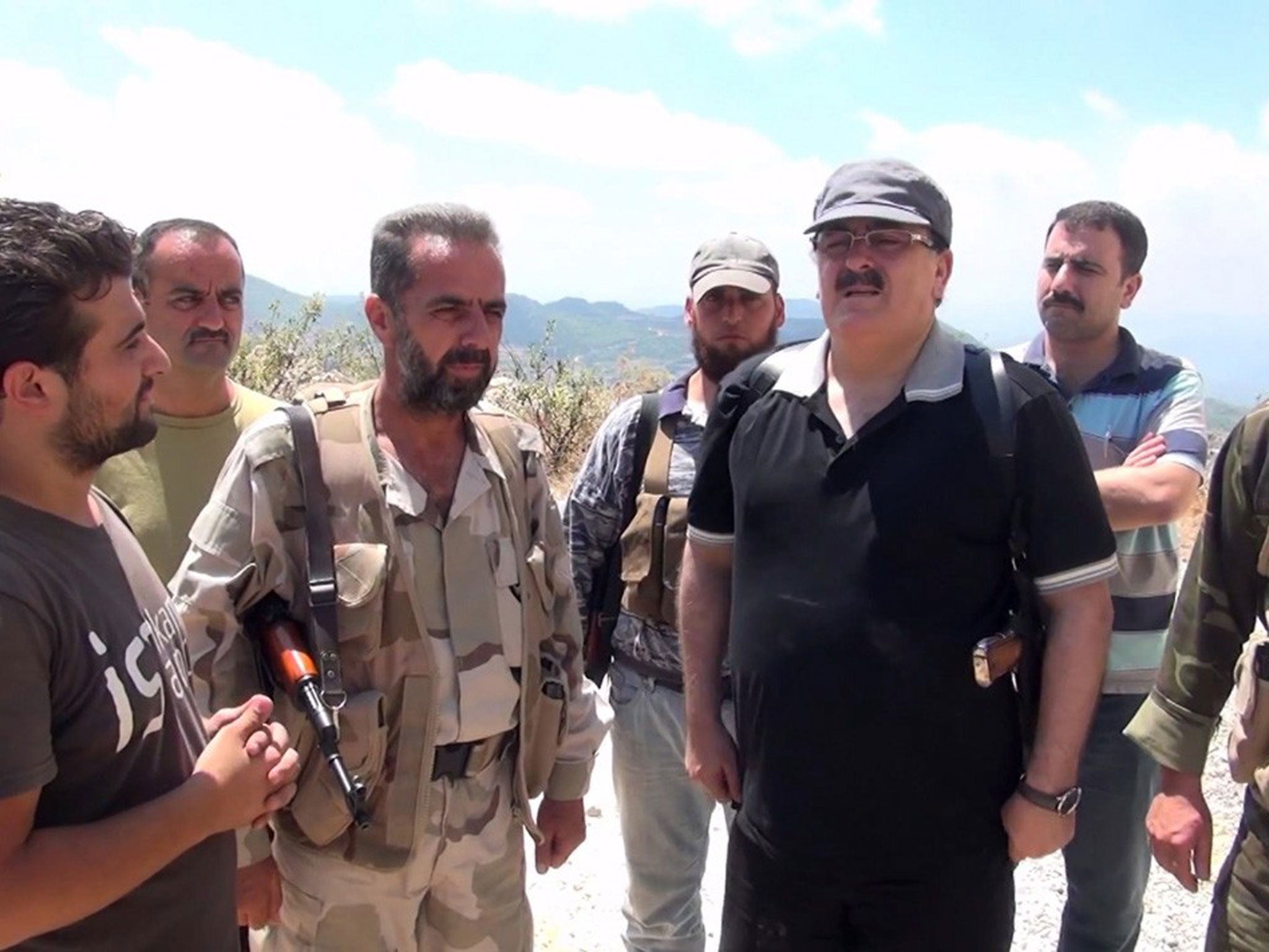 A video clip shows General Salim Idris, right, at Latakia