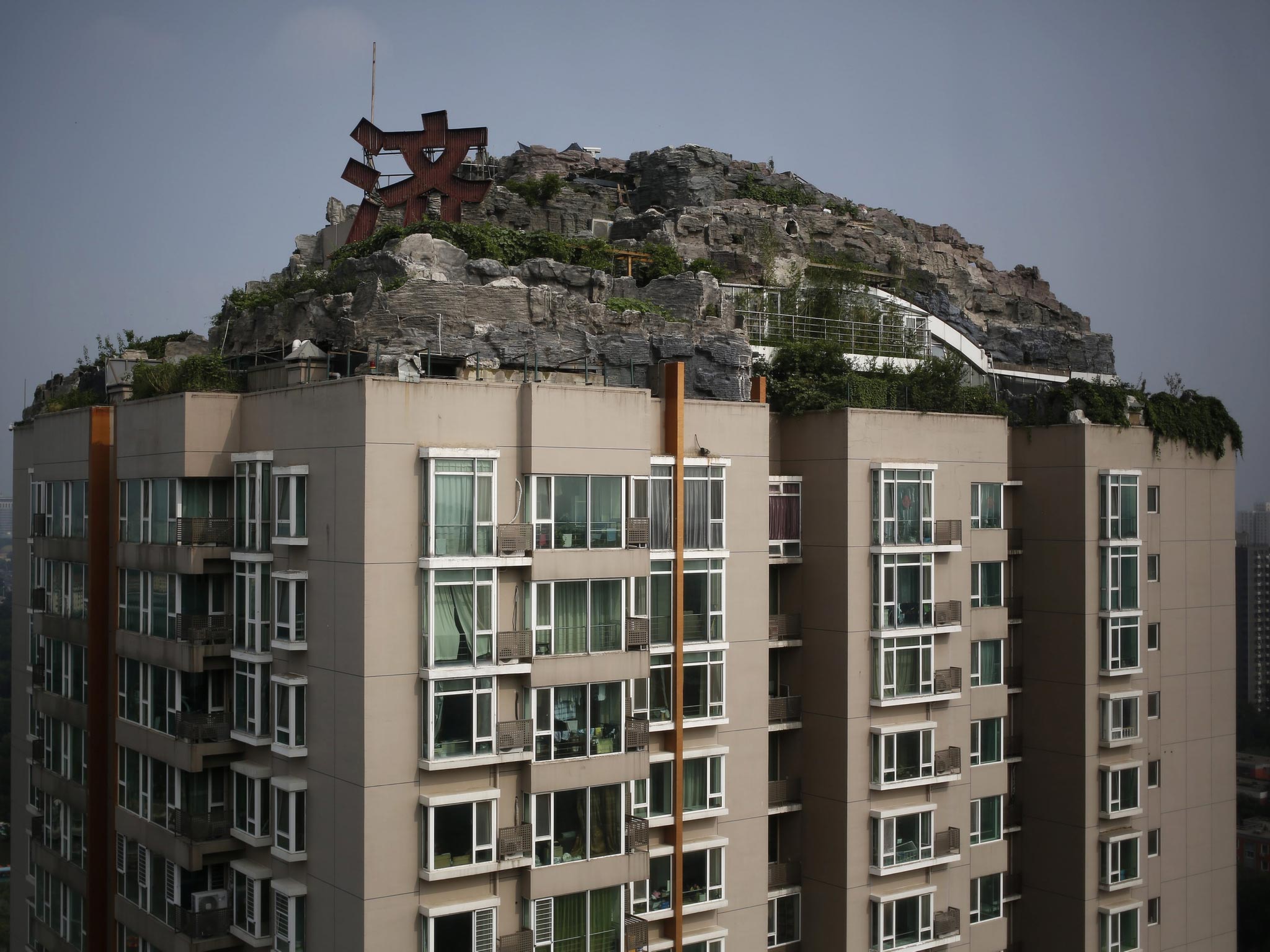 A view of a villa built privately on the rooftop of a 26-storey residential block in Beijing, China