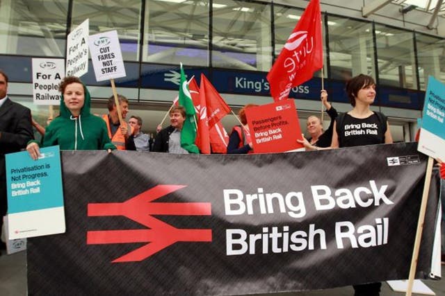 The Action for Rail campaign group protest over rail fares, outside Kings Cross Station in London