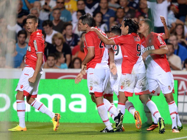Monaco's Colombian forward Radamel Falcao (R) and teammates celebrate after a goal during a French L1 football match against Bordeaux