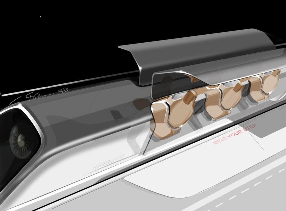 An image of the Hyperloop passenger capsule with doors open at the station