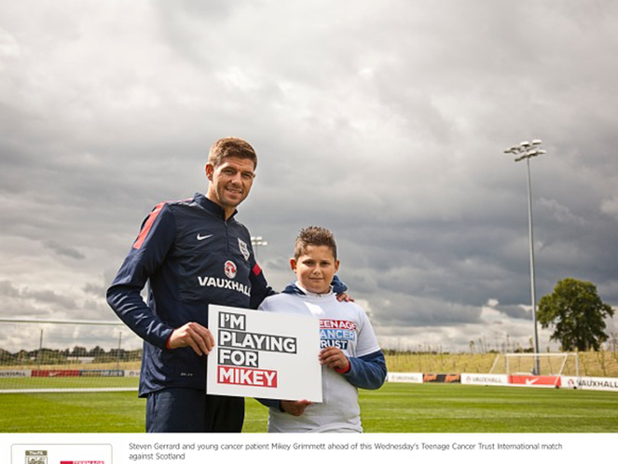 Steven Gerrard and young cancer patient Mikey Grimmett ahead of this Wednesday's Teenage Cancer Trust International match against Scotland