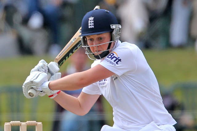 England’s Heather Knight hits out on her way to a score of 157