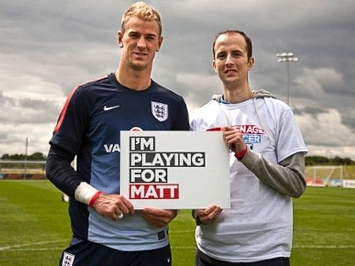 Joe Hart with patient Matt Burton before the match in aid of the Teenage Cancer Trust