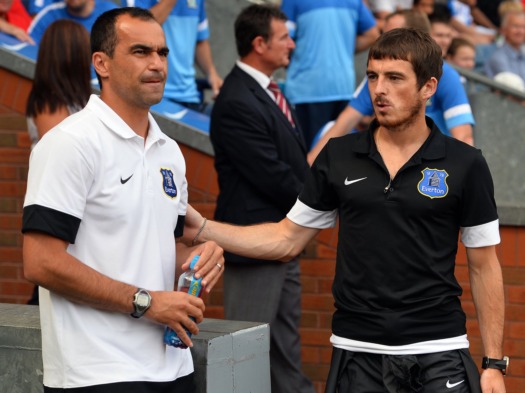 Roberto Martinez is confident Leighton Baines will stay with Everton despite Manchester United interest