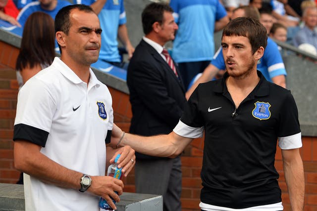 Roberto Martinez is confident Leighton Baines will stay with Everton despite Manchester United interest