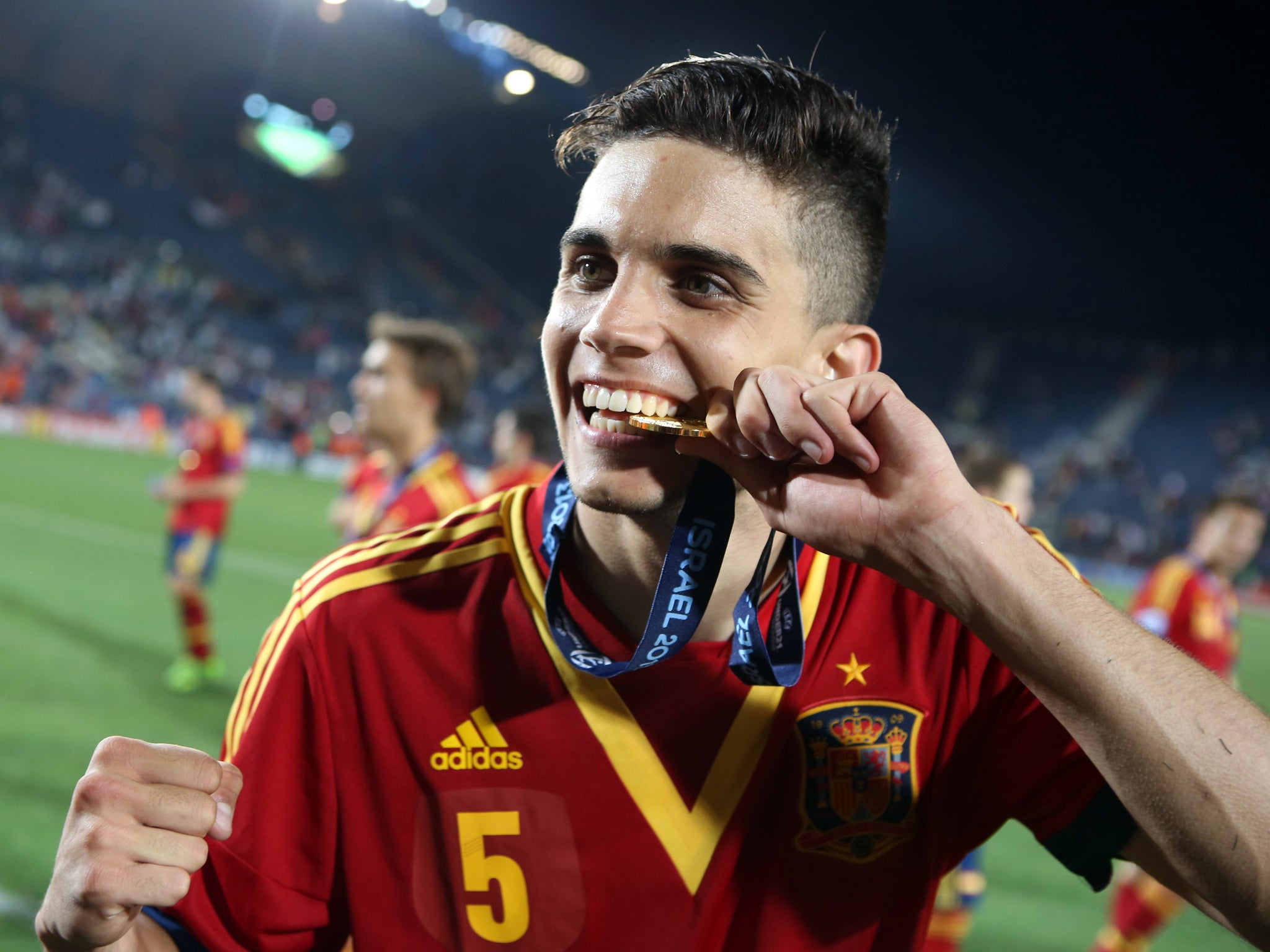 Marc Bartra celebrates after winning the European Under-21's Championship with Spain