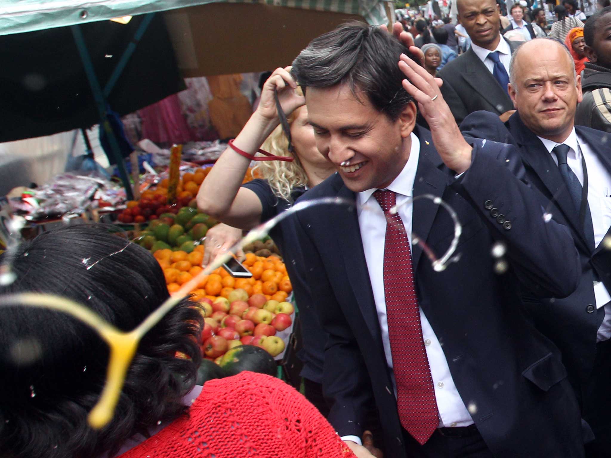 Labour leader Ed Miliband after he was pelted with eggs during a campaign visit in East Street market