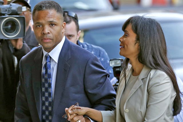 Jesse Jackson Jr and his wife Sandi arrive in court