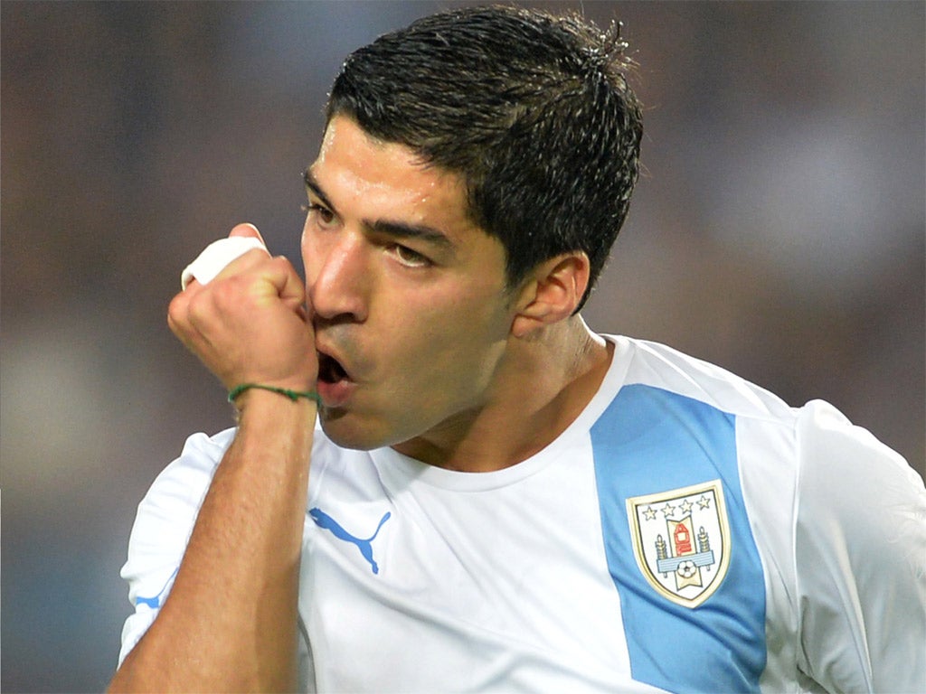 Luis Suarez played and scored for Uruguay against Japan