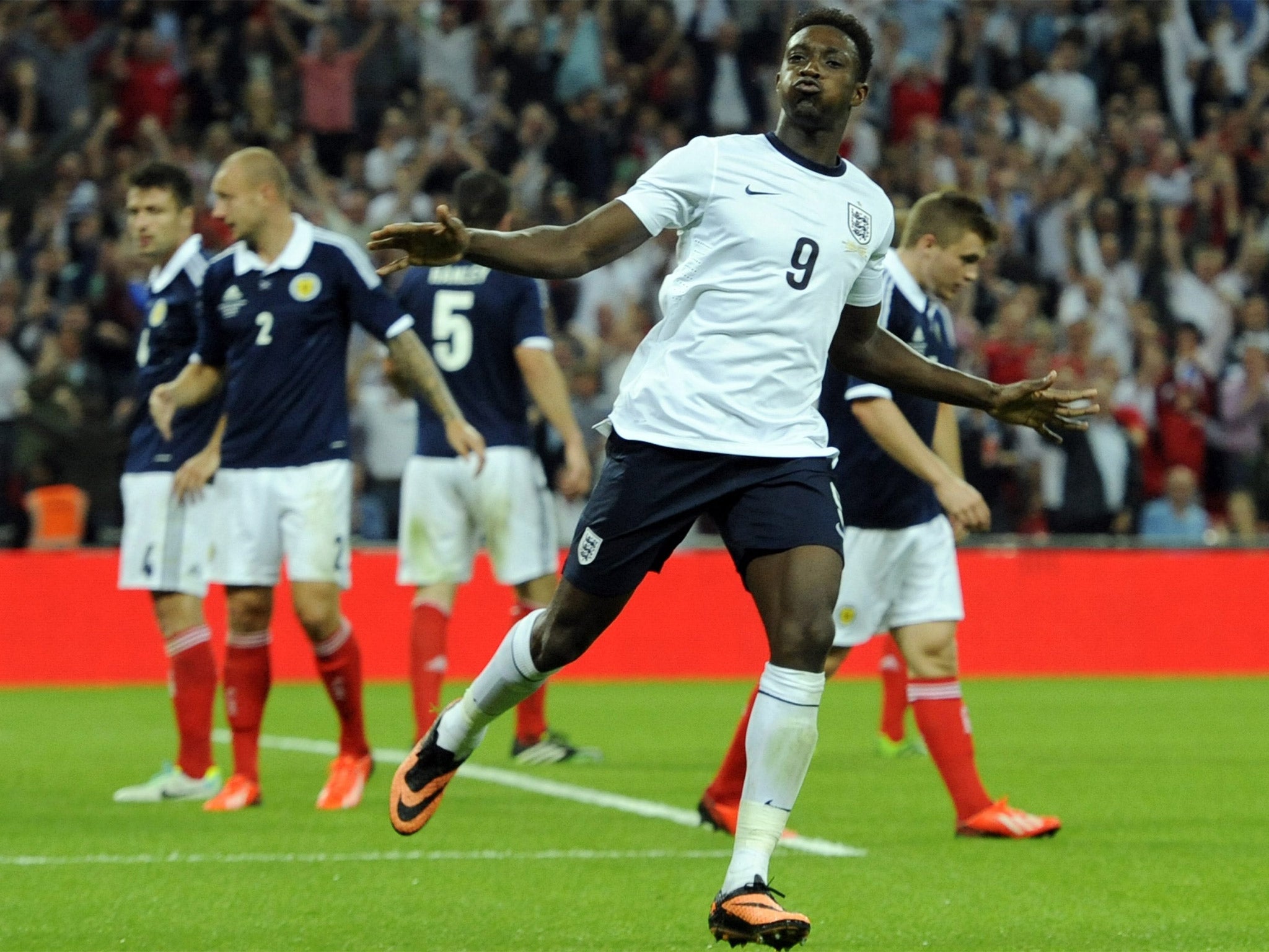 Danny Welbeck takes the applause after heading in England’s second goal