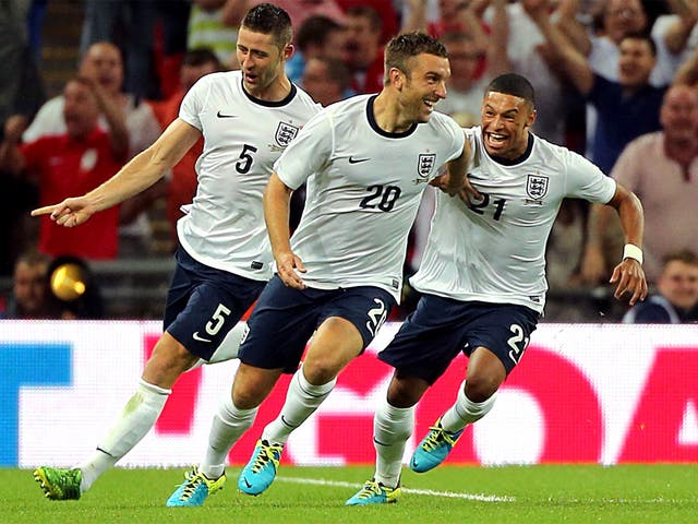 Rickie Lambert (middle) celebrates scoring England’s winner