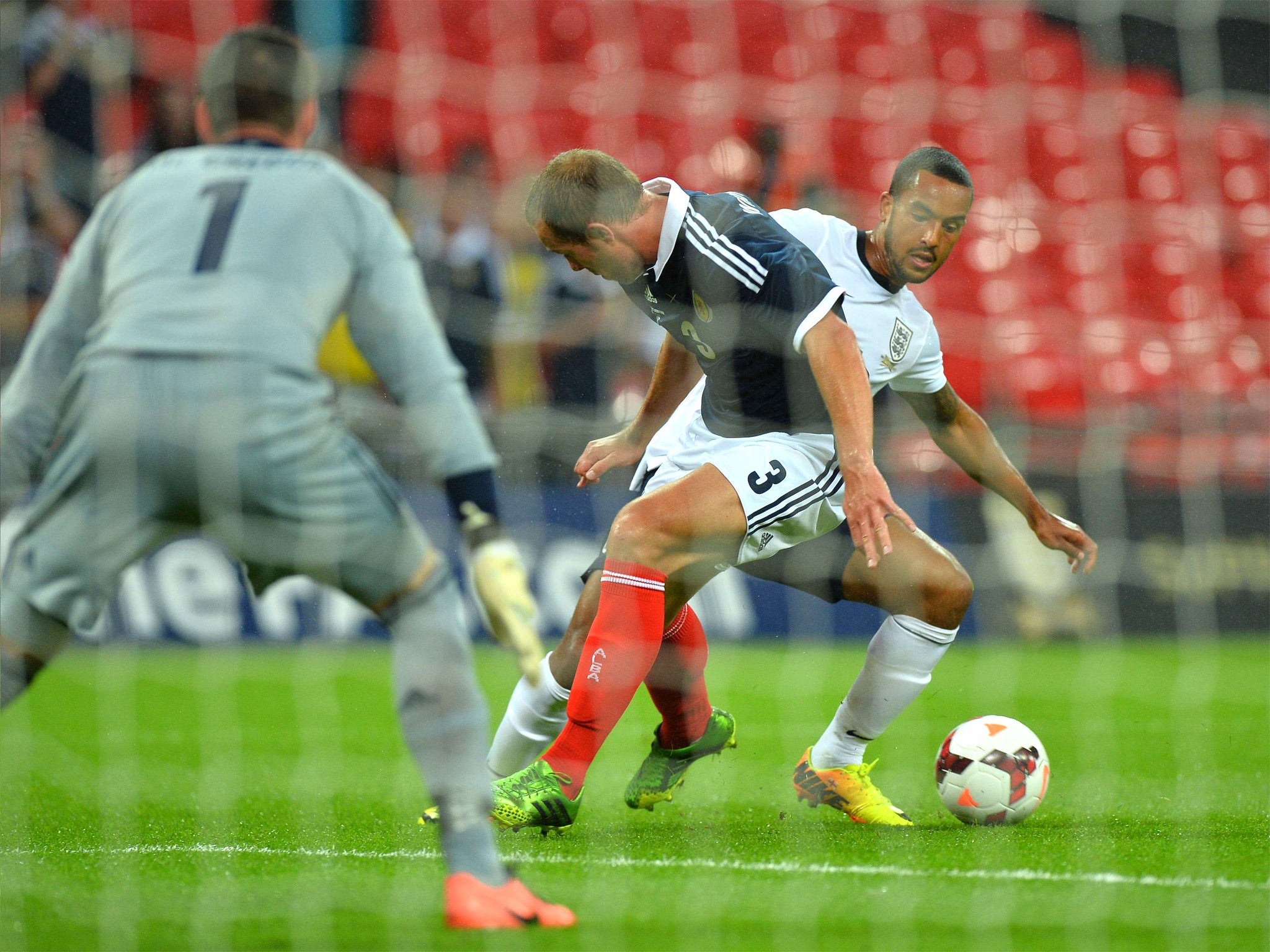 Theo Walcott turns Steven Whittaker inside out (Getty)