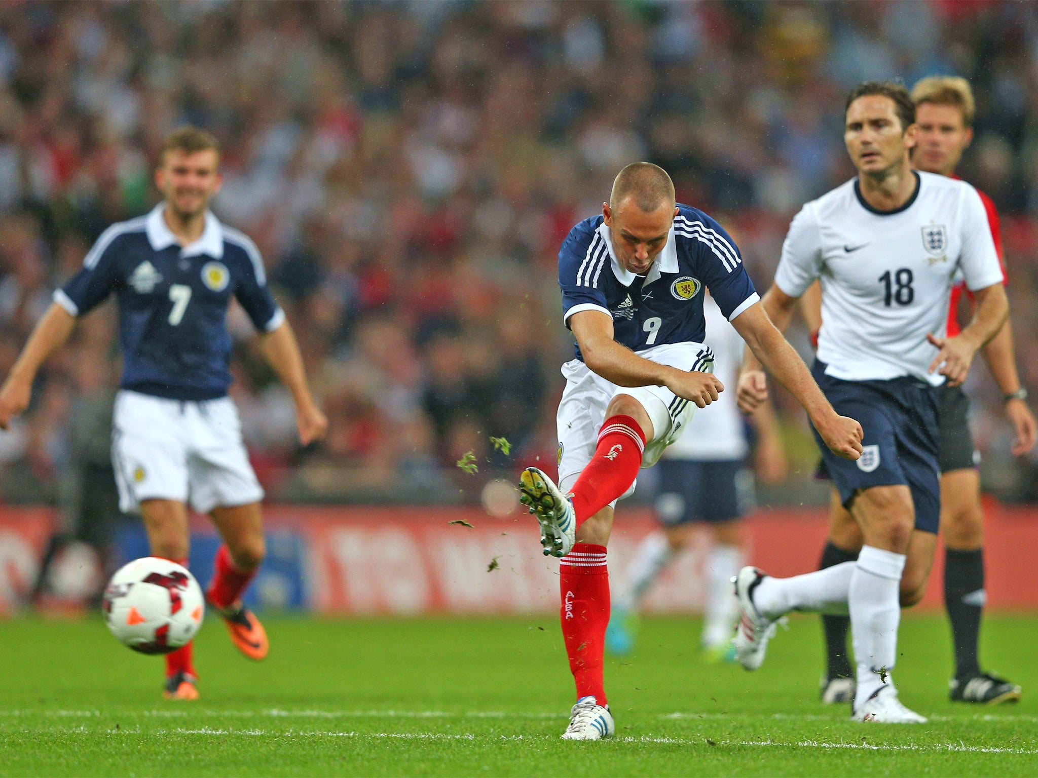 Kenny Miller's thumping finish gives Scotland their second surprise lead of the night