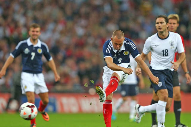 Kenny Miller's thumping finish gives Scotland their second surprise lead of the night