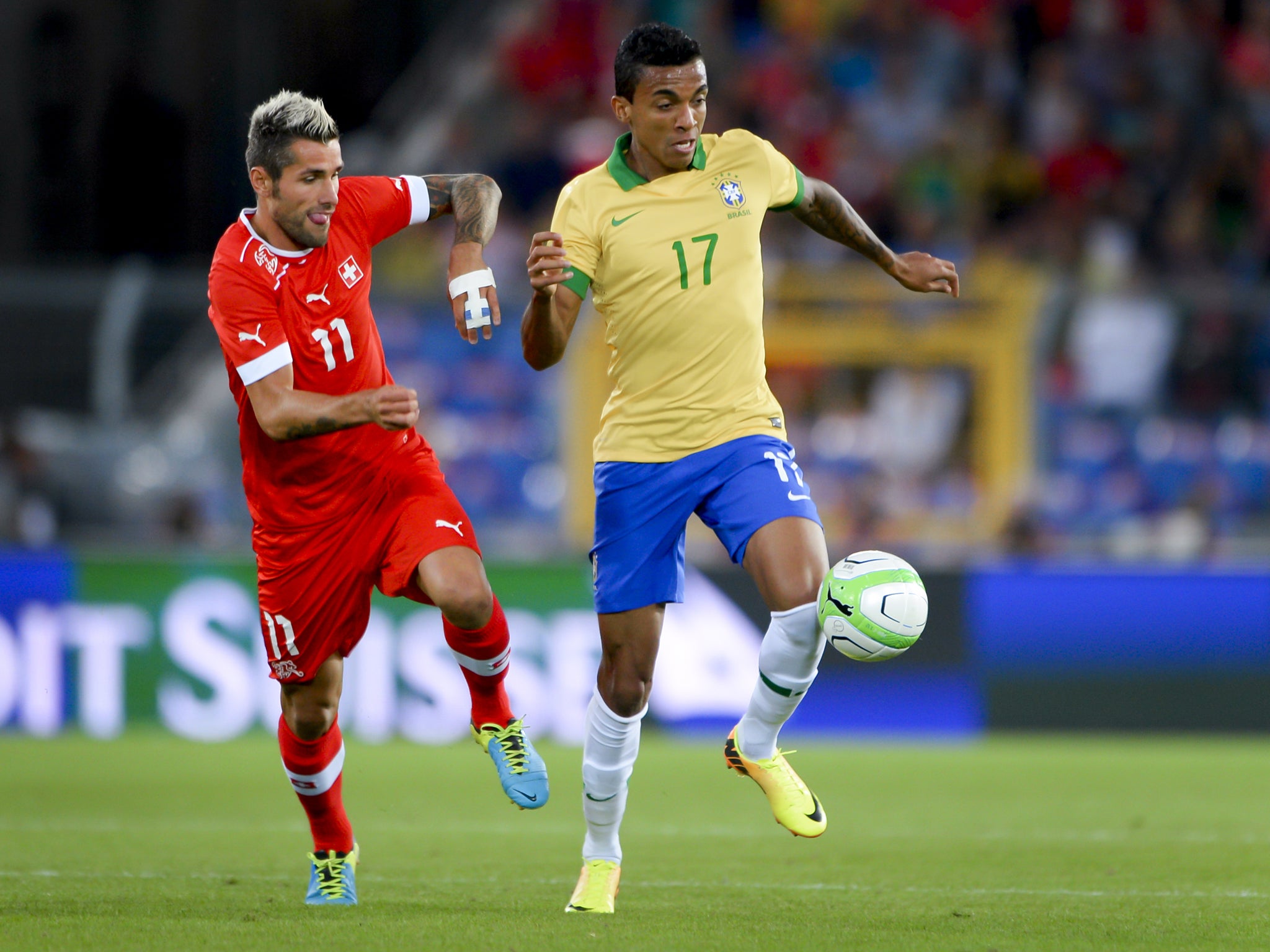 Luiz Gustavo in action for Brazil against Switzerland