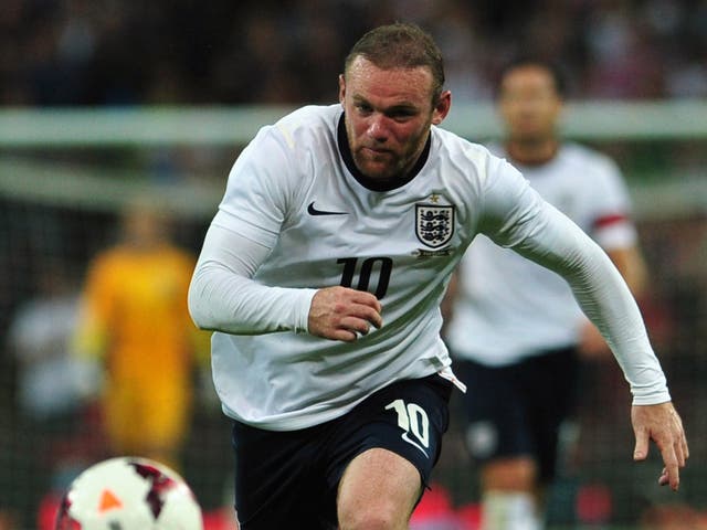 Wayne Rooney in action for England against Scotland